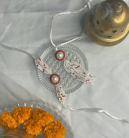 Red Pearl Rakhi Set
