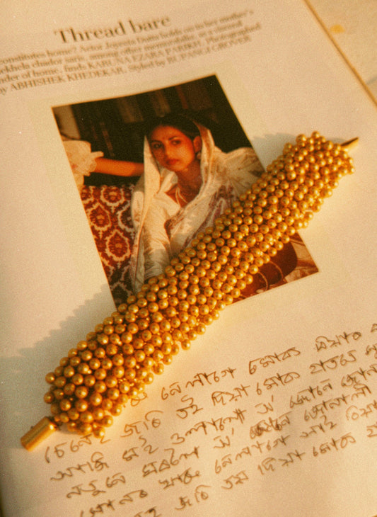 Gold ghungroo bracelet