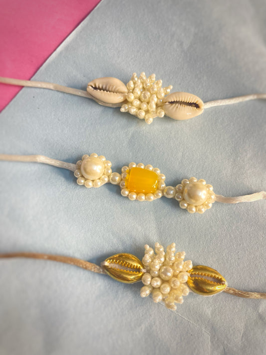 Shell Rakhi Set